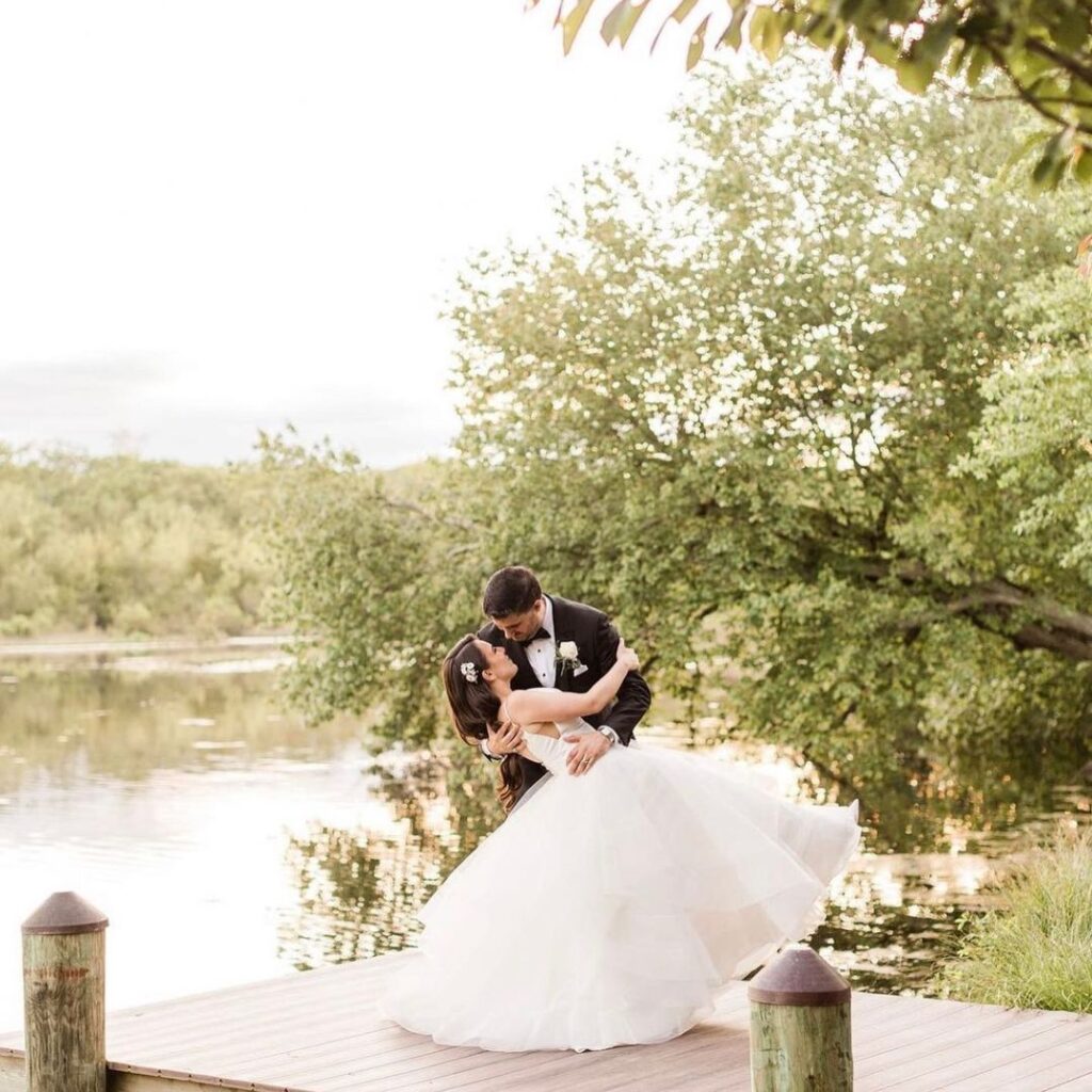 bride and groom on the water at the New Jersey Wedding Venue The Mill Lakeside Manor