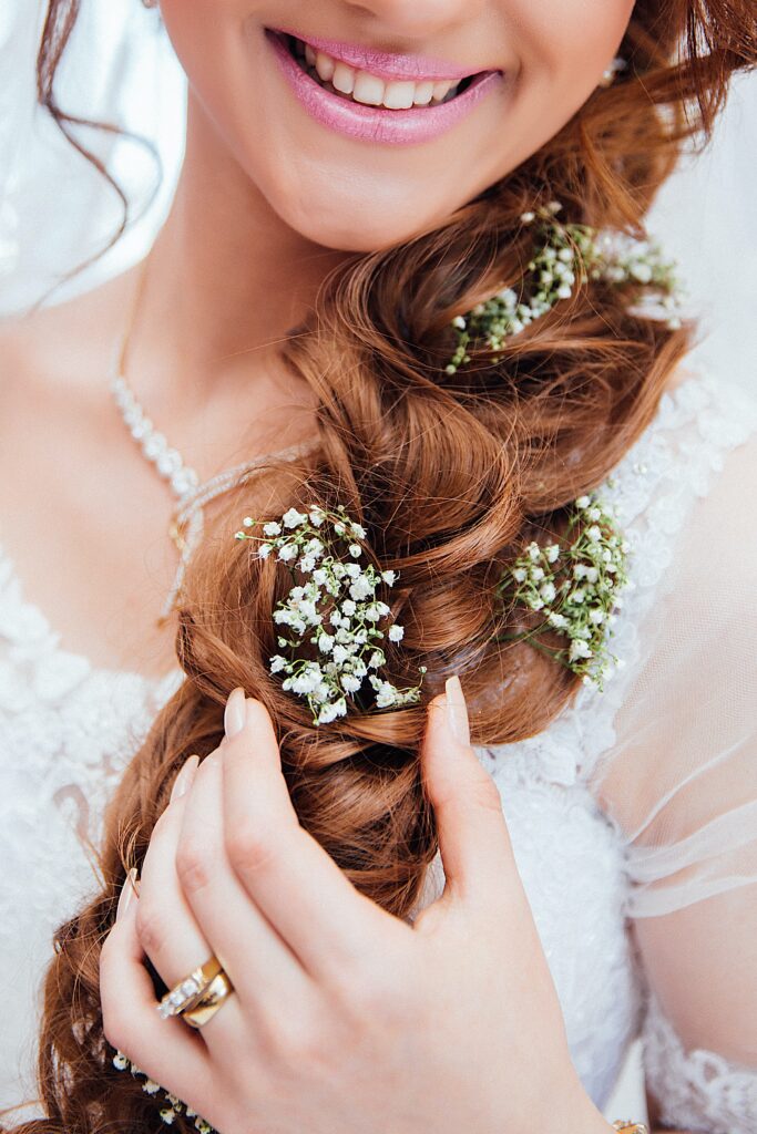 bride getting ready for wedding day. bridal hairstyle