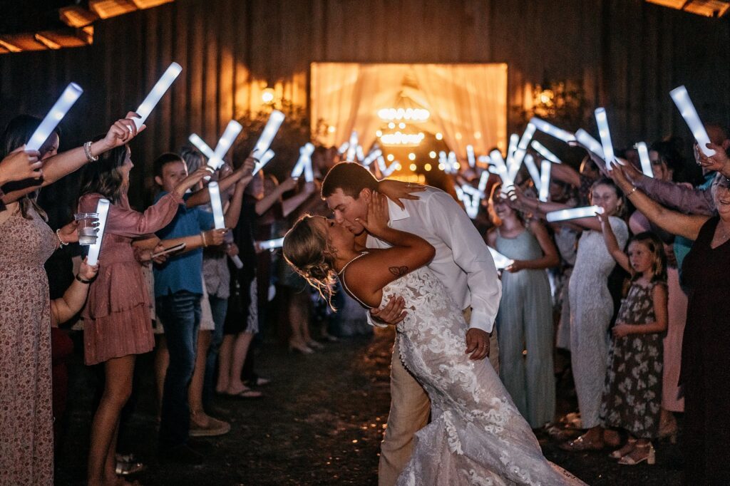 send off of glow sticks at rustic oaks ranch wedding venue. 