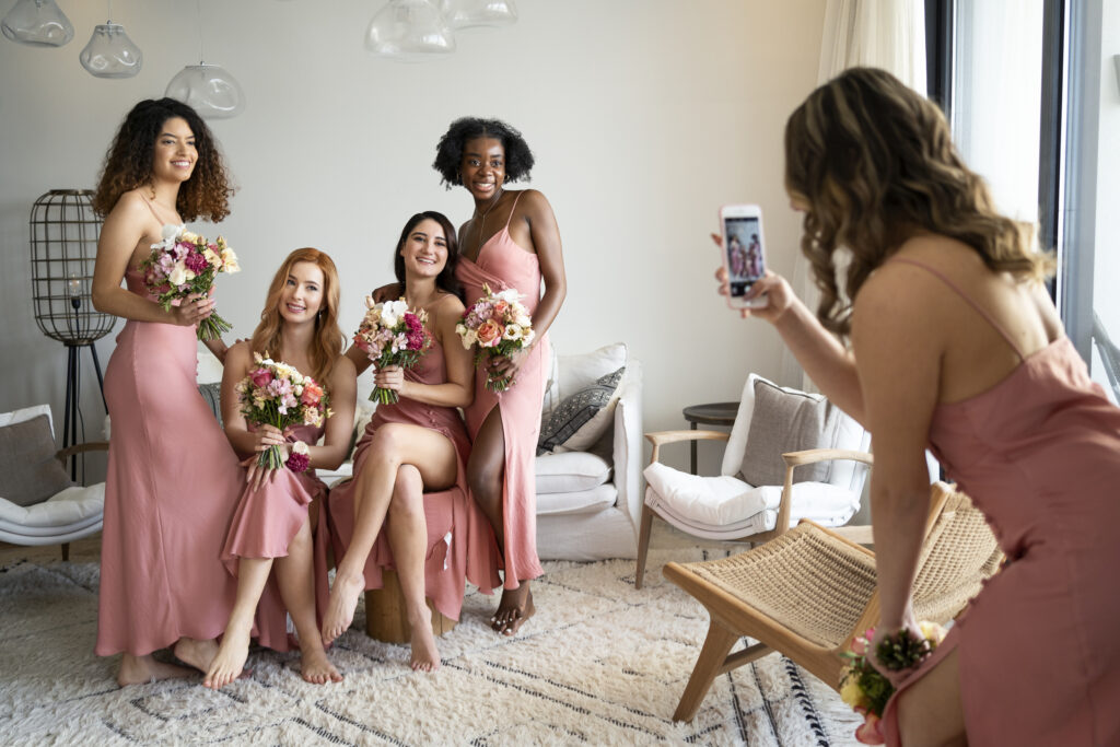 bridesmaids taking selfies