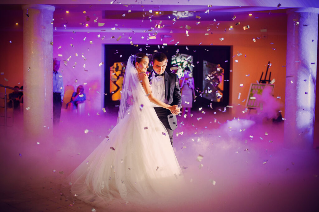 bride and groom first dance with fog and smoke and confetti. The Latest Photography Trends in Wedding Photography