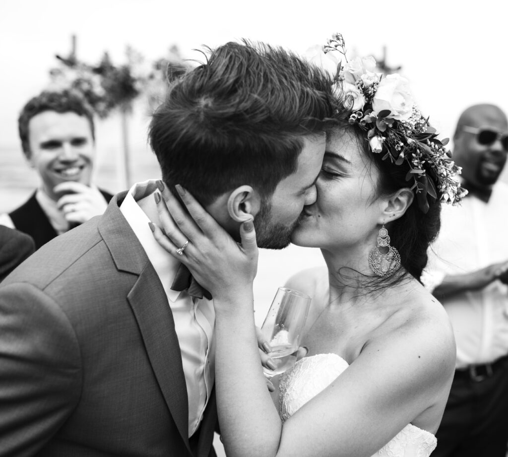 Bride and Groom kissing for the first time. The Latest Photography Trends in Wedding Photography