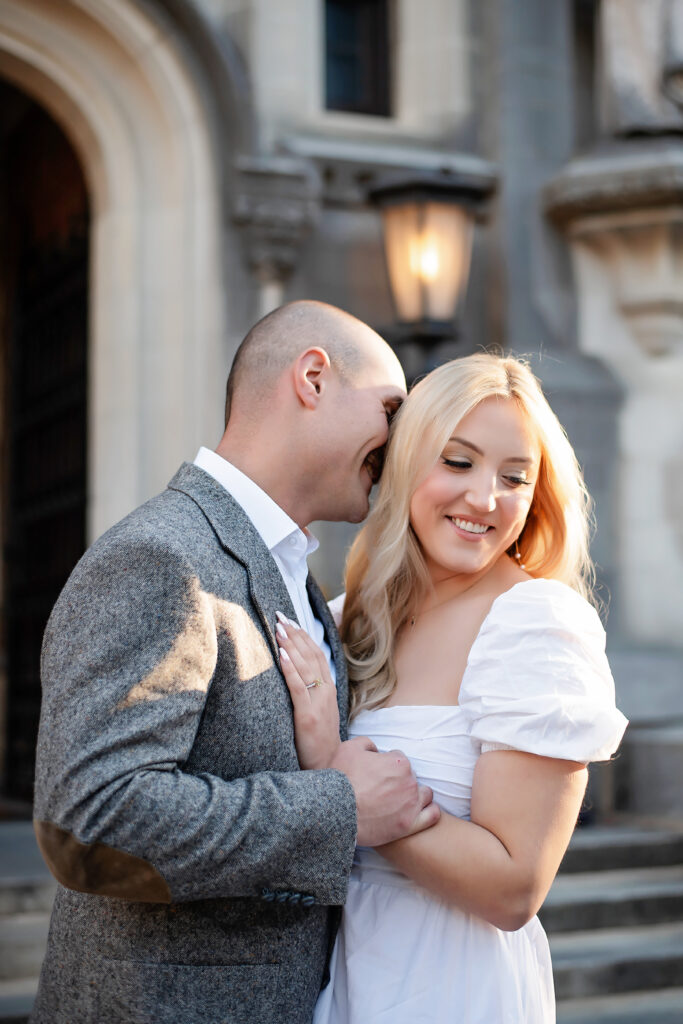 Couple embracing at their princeton university engagement session