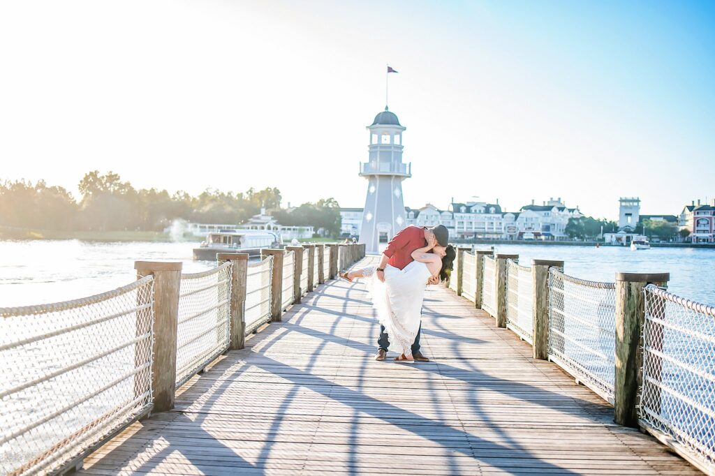 couple dipping on the bridge at their Disney Engagement Photos