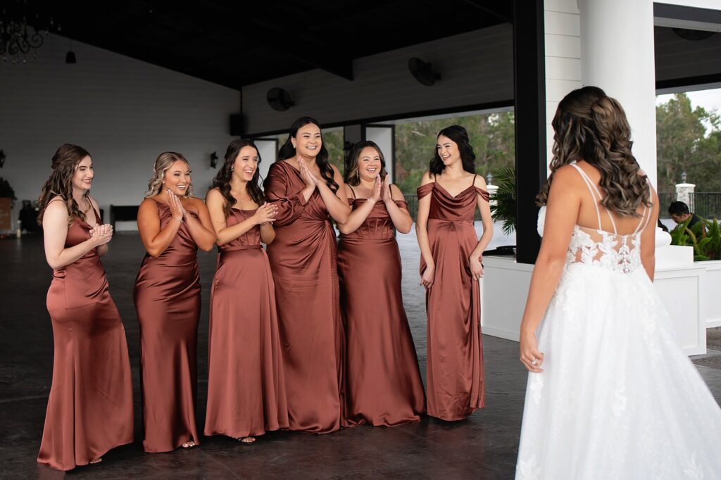 first look with bride and bridesmaids at valley view