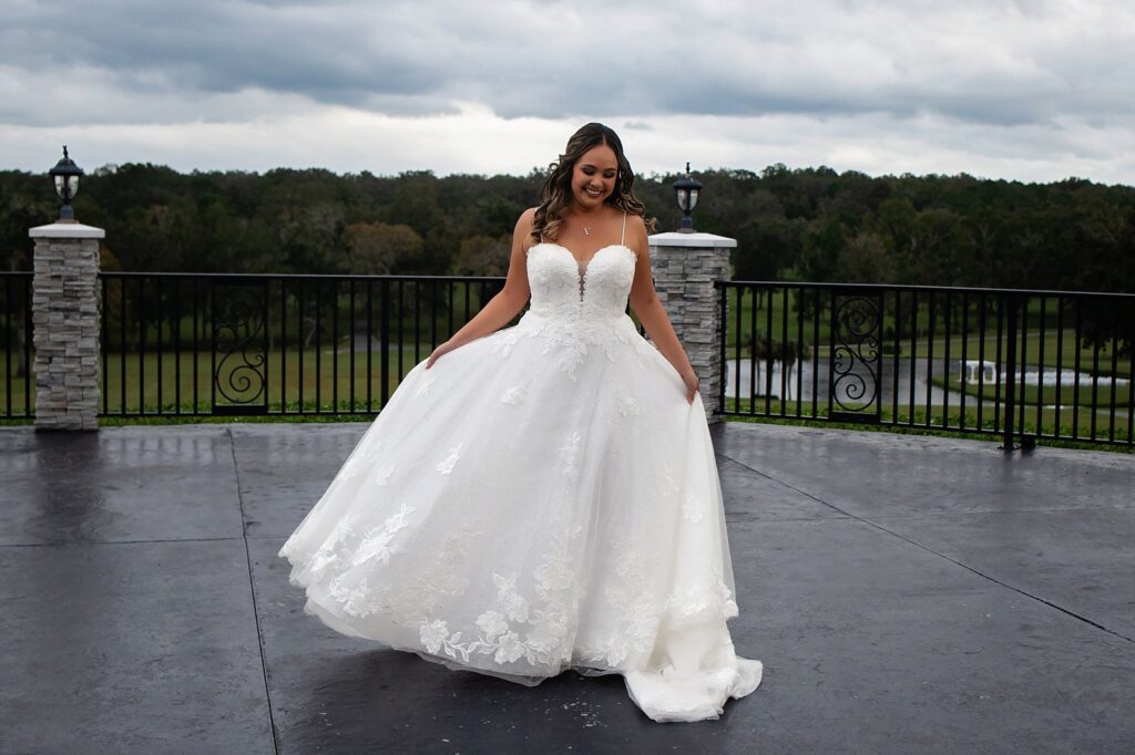 bride twirling in her dress